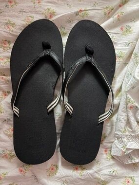 Black flip flops